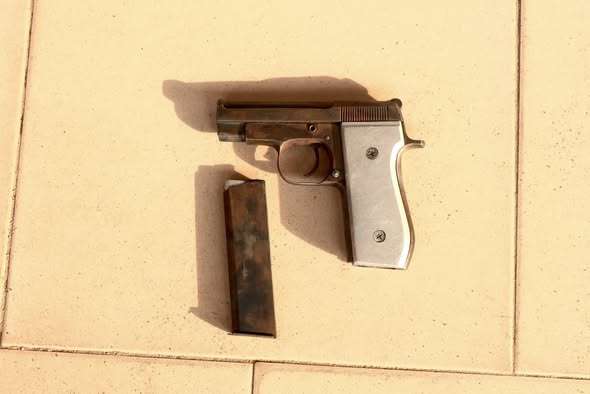 Police Nab Medical Doctor Over Illegal Beretta Pistol — Manhunt for Accomplices Begins