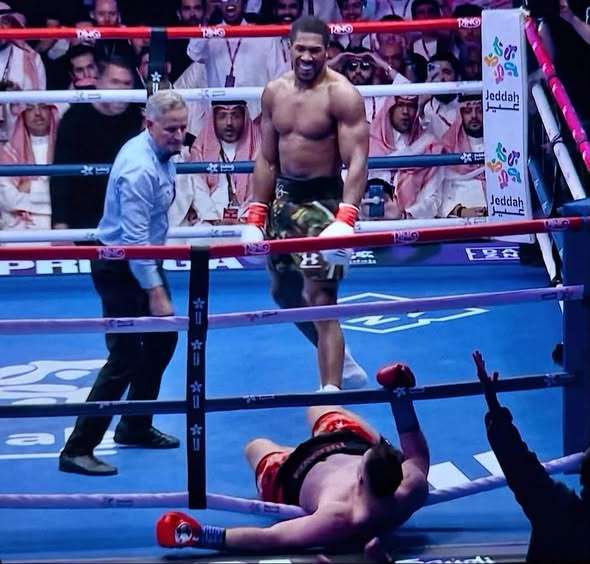 Anthony Joshua Battles Back from Two Knockdowns to Stop Prenga